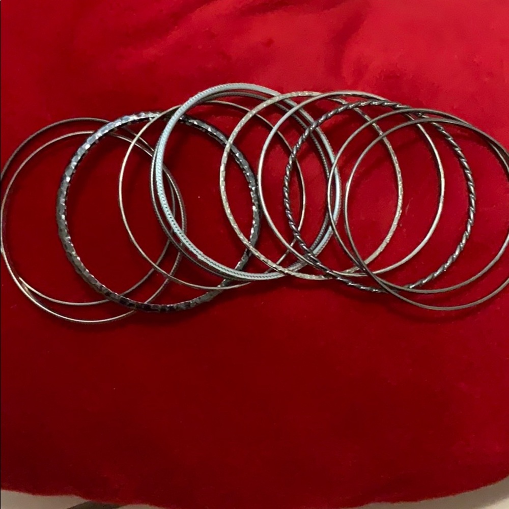 Set of 11 costume jewelry silver bangles